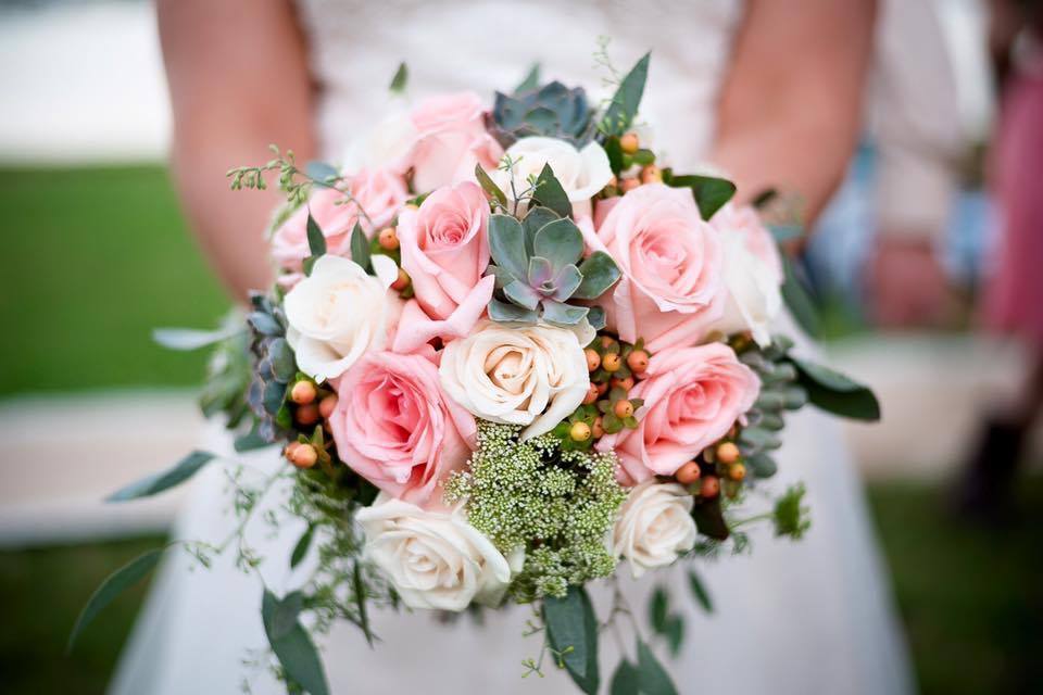 Bridal bouquet with pink roses and succulents